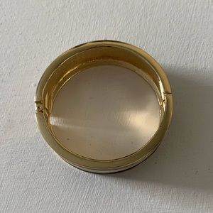 Black, white, and gold bangle